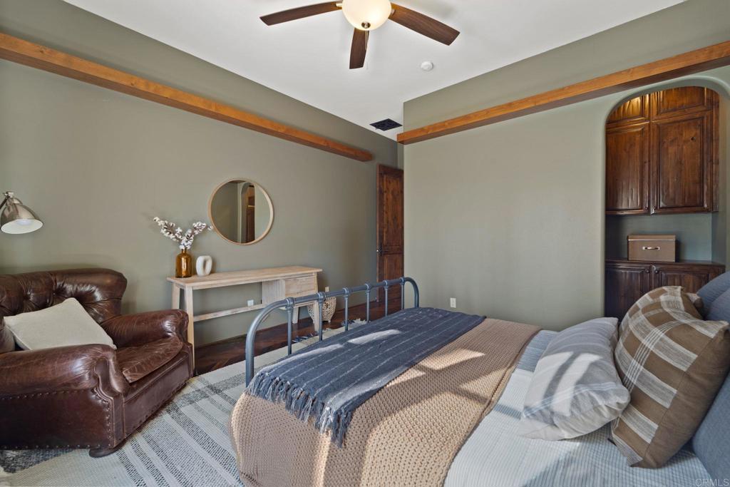 2908 Gate 5 Place Chula Vista, CA 91914 - Photo 40 of 63 a bedroom with a bed desk and chair