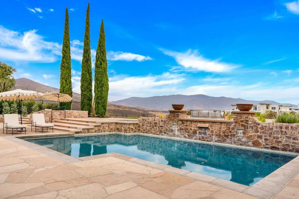2908 Gate 5 Place Chula Vista, CA 91914 - Photo 49 of 63 a view of a swimming pool and a terrace