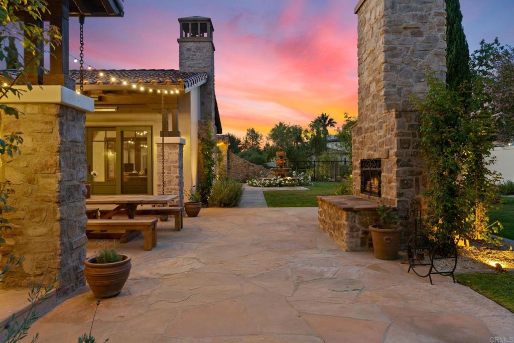 2908 Gate 5 Place Chula Vista, CA 91914 - Photo 58 of 63 a view of a patio with table and chairs with wooden fence