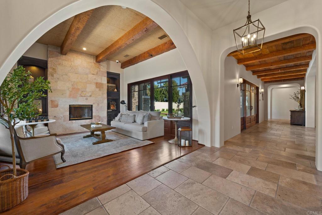 2908 Gate 5 Place Chula Vista, CA 91914 - Photo 8 of 63 a living room with furniture and a fireplace