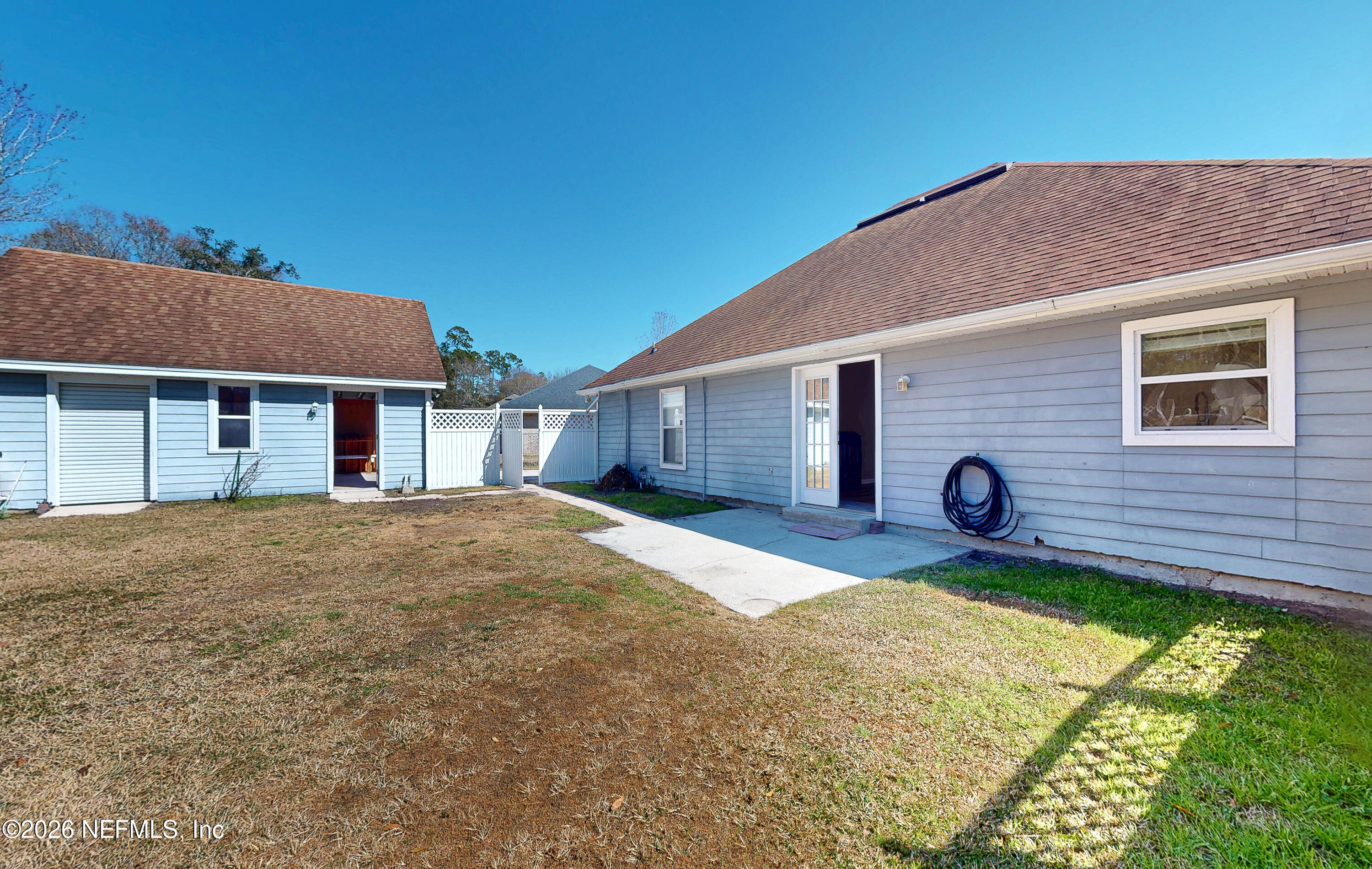 55592 Deer Run Road Callahan, FL 32011 - Photo 23 of 37 Ext Backyard Patio
