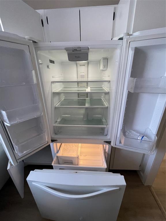 Undisclosed Address Fort Lauderdale, FL 33308 - Photo 12 of 28 a view of walk in closet with empty racks