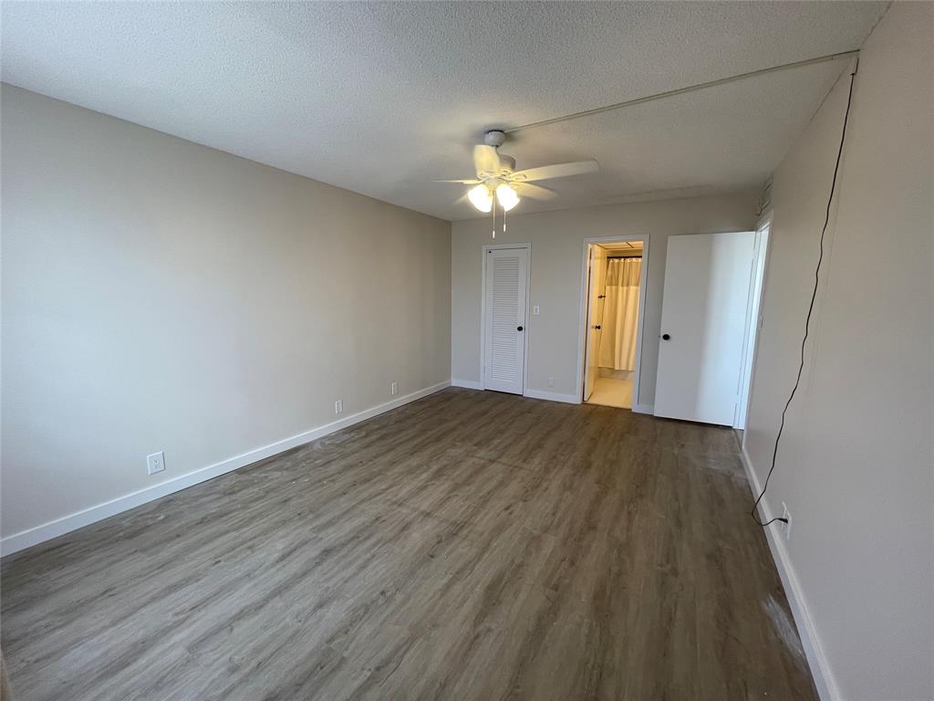 Undisclosed Address Fort Lauderdale, FL 33308 - Photo 18 of 28 wooden floor in an empty room