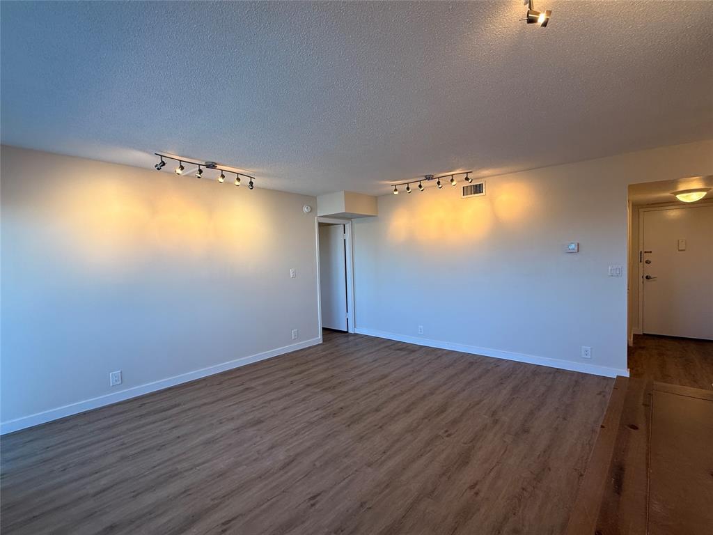 Undisclosed Address Fort Lauderdale, FL 33308 - Photo 4 of 28 a view of empty room with wooden floor