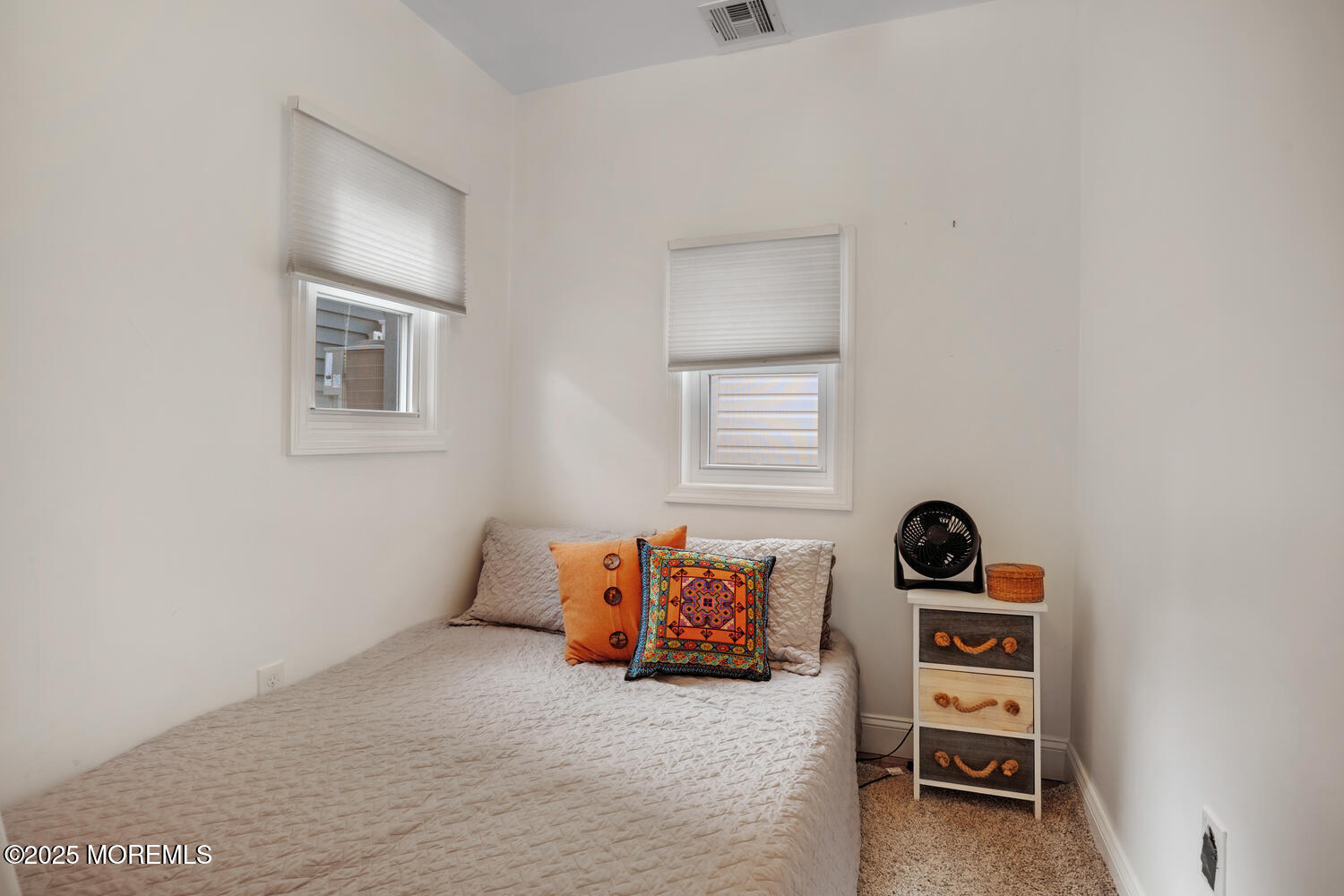 34 West Rutherford Lane Lavallette, NJ 08735 - Photo 15 of 27 a room with a window and couch