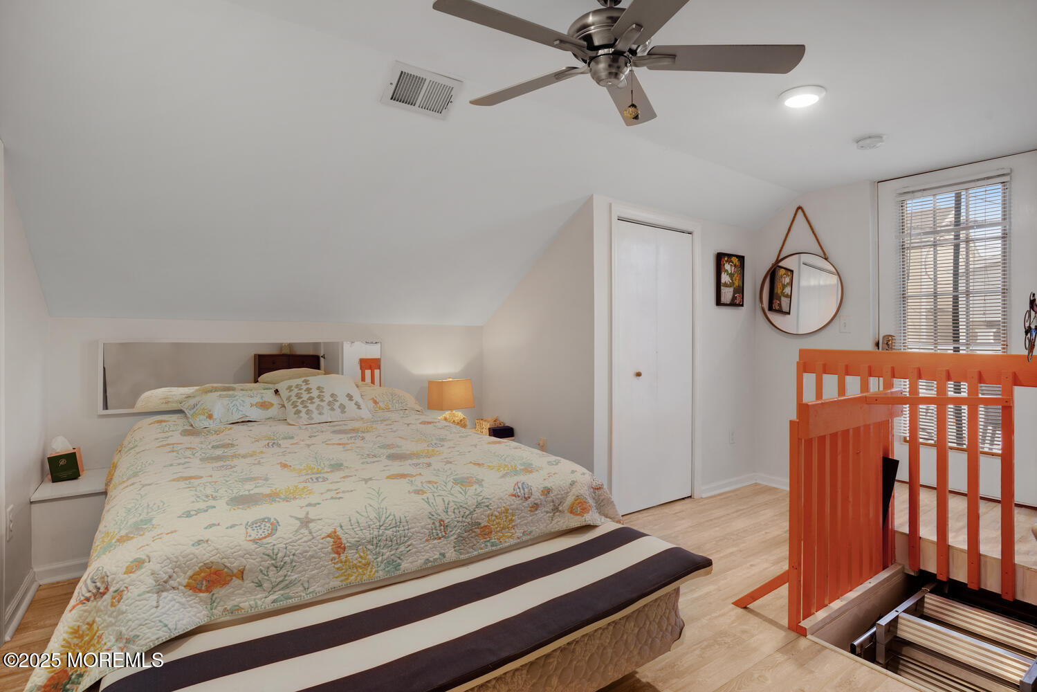 34 West Rutherford Lane Lavallette, NJ 08735 - Photo 24 of 27 a bedroom with a bed and a window