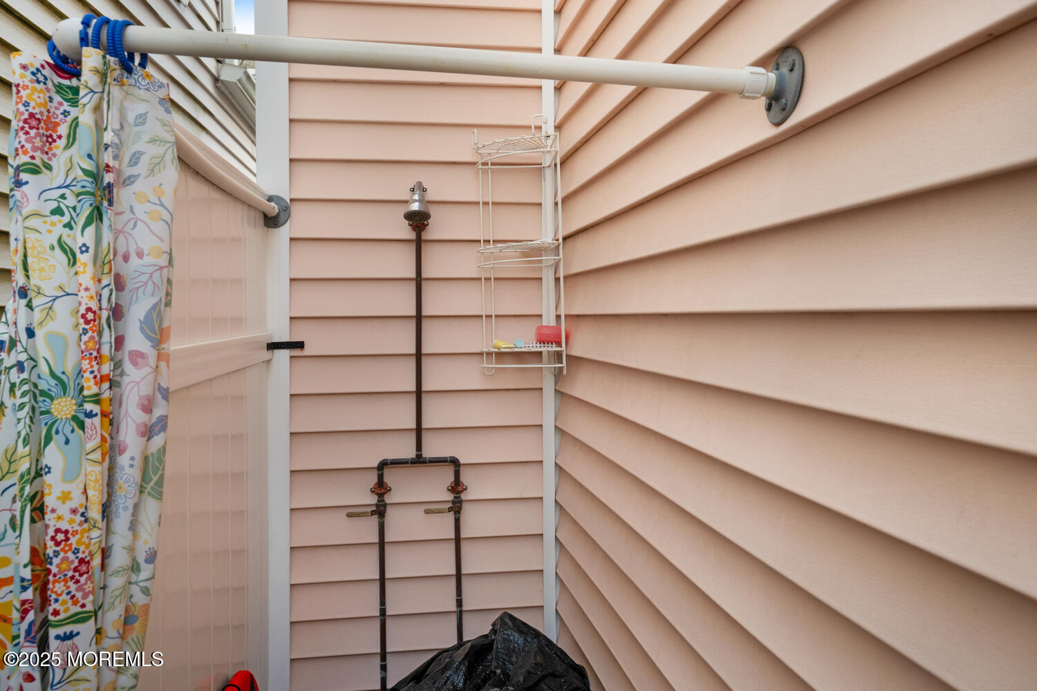 34 West Rutherford Lane Lavallette, NJ 08735 - Photo 6 of 27 a view of walk in closet with empty racks