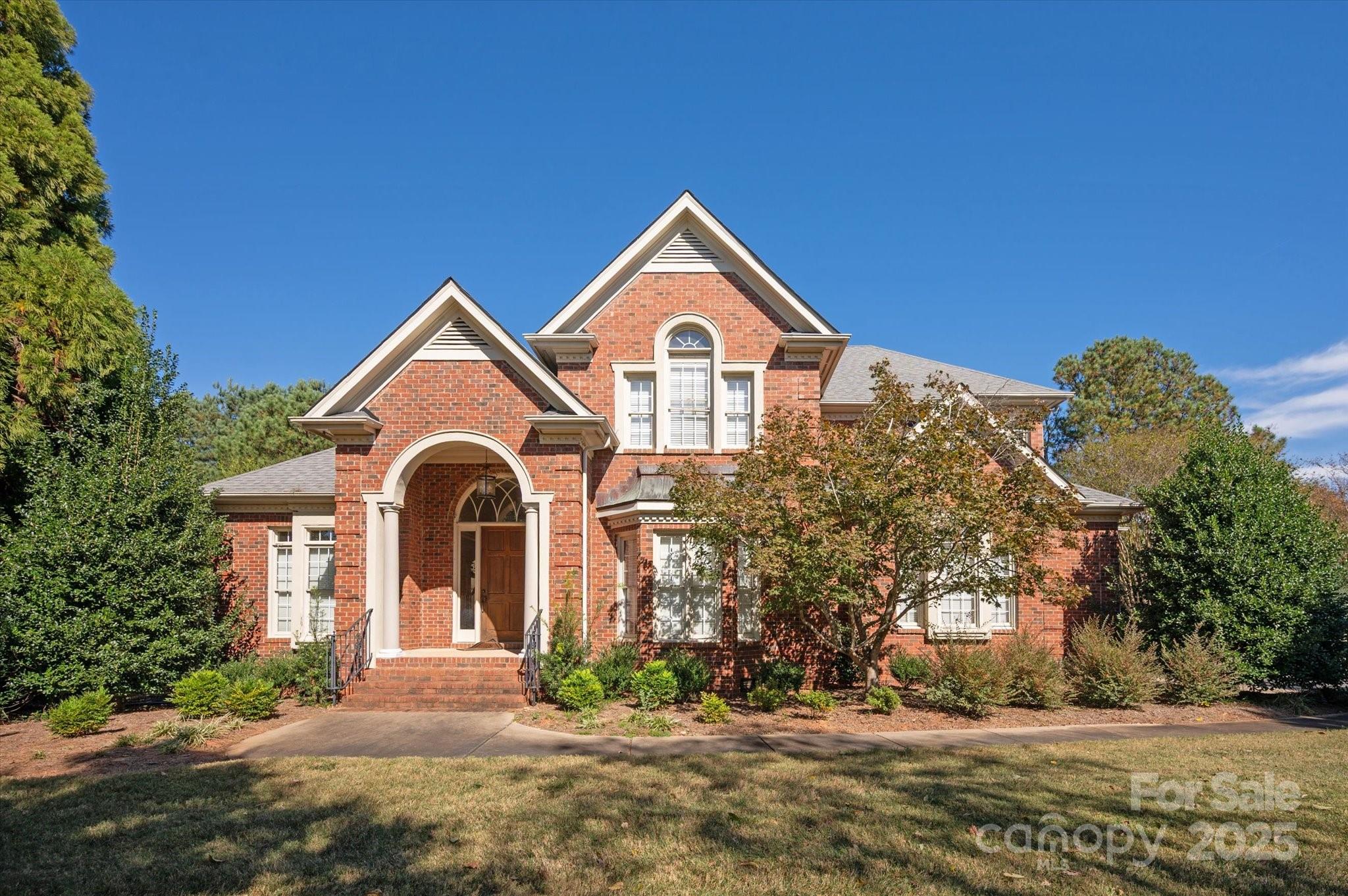 405 Valley Run Road Waxhaw, NC 28173 - Photo 2 of 9 a front view of a house with a yard