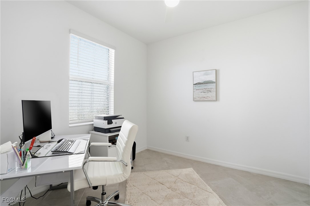 2662 Scarlet Way Naples, FL 34120 - Photo 21 of 47 a view of a workspace with furniture