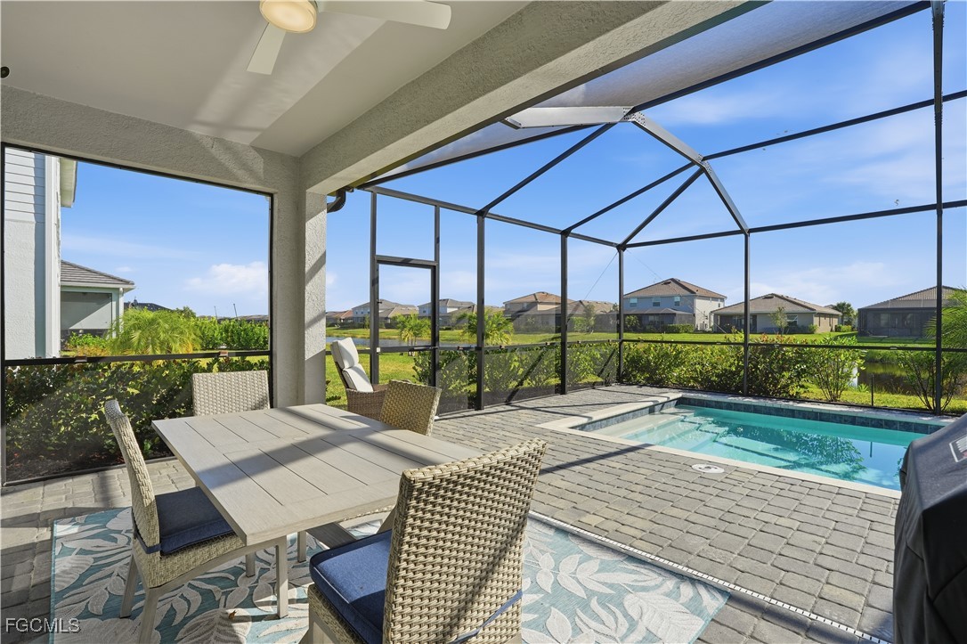 2662 Scarlet Way Naples, FL 34120 - Photo 25 of 47 a view of swimming pool from a balcony
