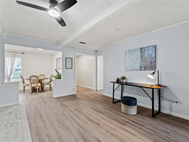 a view of a livingroom with furniture and a couch