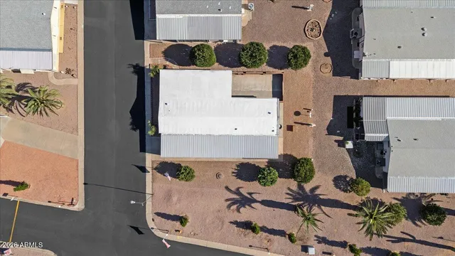 an aerial view of a house with a potted plant
