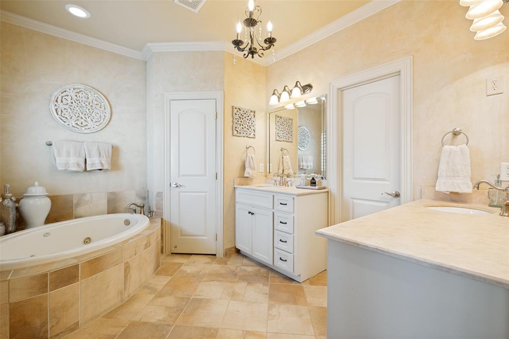 3907 Cole Avenue, Unit 3 Dallas, TX 75204 - Photo 19 of 38 Primary Ensuite Bath with dual vanities, separate shower & walk-in closet.