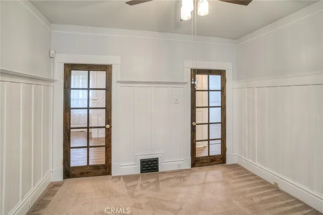 a bathroom with a sink a mirror and a shower curtain