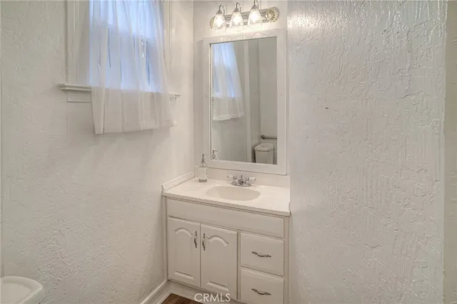 a bathroom with a sink and a toilet