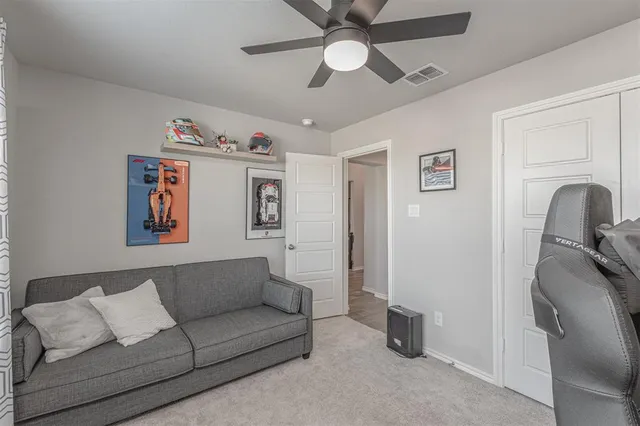 a living room with furniture and a couch