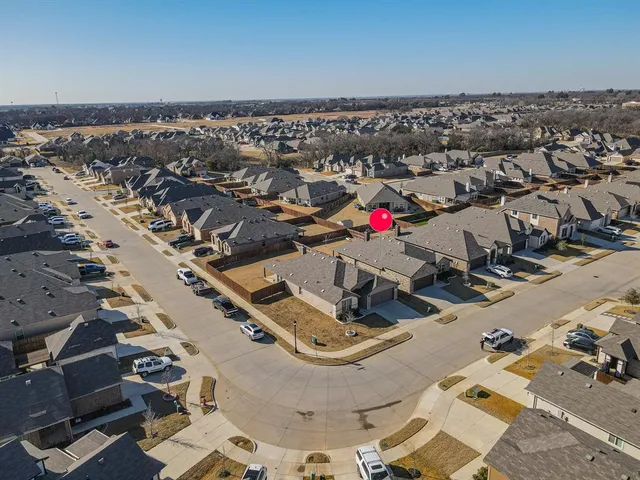an aerial view of a parking space
