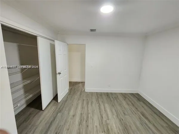 a view of a room with racks on the wall