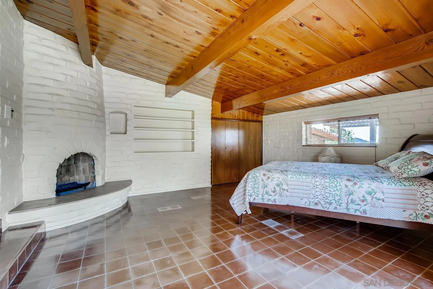 14565 High Valley Road Poway, CA 92064 - Photo 15 of 28 a bedroom with a bed and window