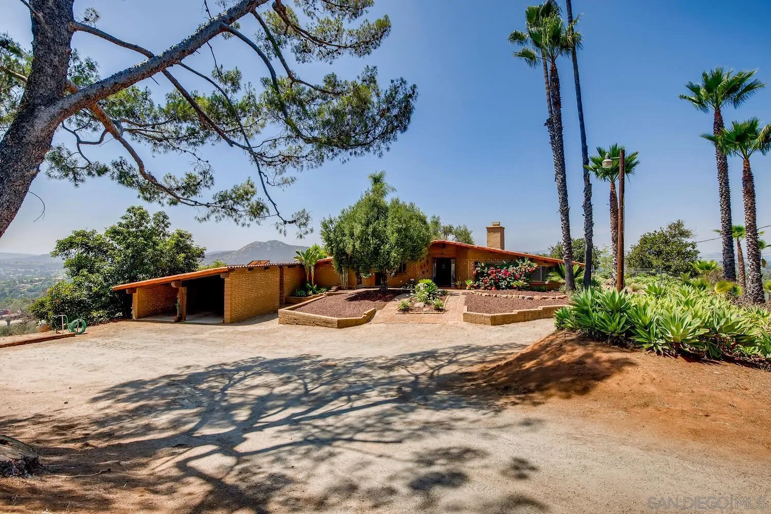 14565 High Valley Road Poway, CA 92064 - Photo 2 of 28 a view of a backyard of the house