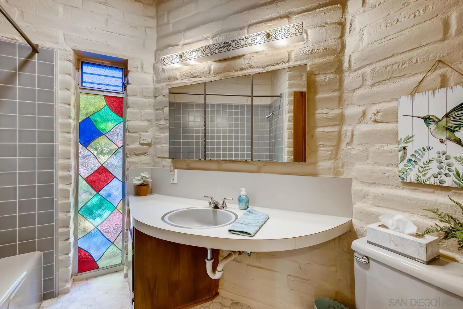 14565 High Valley Road Poway, CA 92064 - Photo 23 of 28 a bathroom with a sink and a bathtub