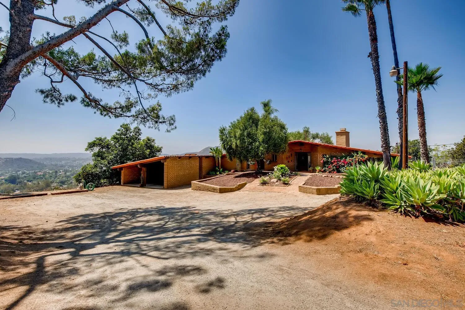 14565 High Valley Road Poway, CA 92064 - Photo 28 of 28 a view of a backyard with a garden