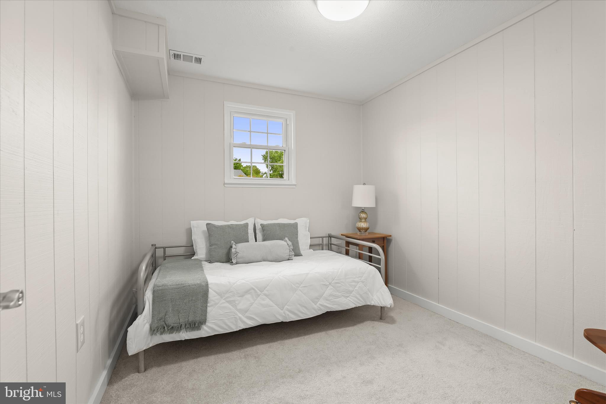 792 Match Point Drive Arnold, MD 21012 - Photo 16 of 43 a bedroom with a bed and painting on the wall