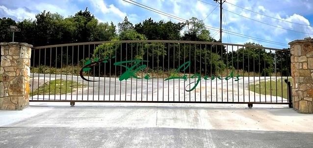 1117 Madrone Road Fischer, TX 78623 - Photo 2 of 11 a white house with a white fence