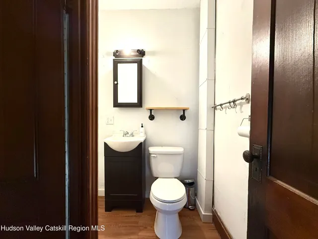 a bathroom with a toilet and a sink