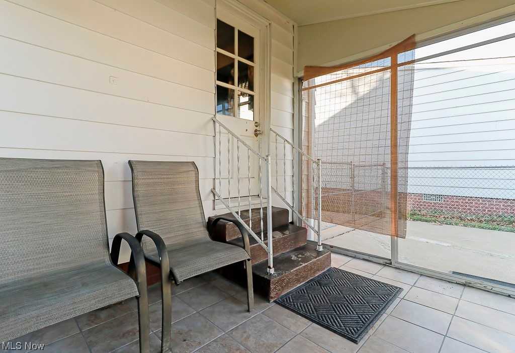 1403 Lander Road Cleveland, OH 44124 - Photo 13 of 17 Enclosed Patio