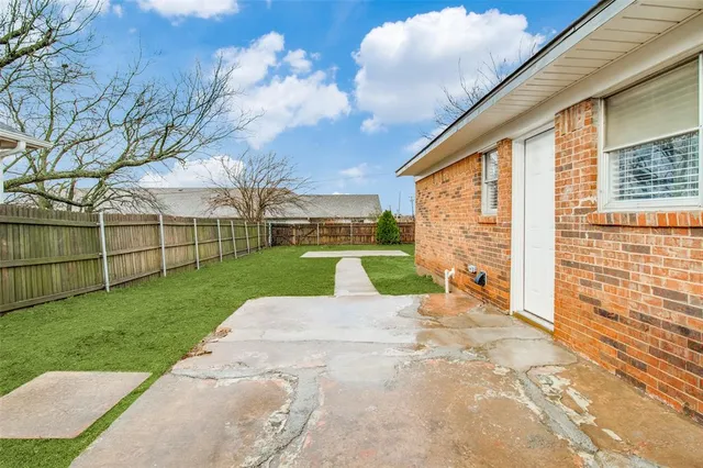 a view of a garden with a pathway