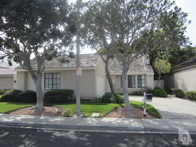 237 Village Road Port Hueneme, CA 93041 - Photo 2 of 30 a front view of a house with garden