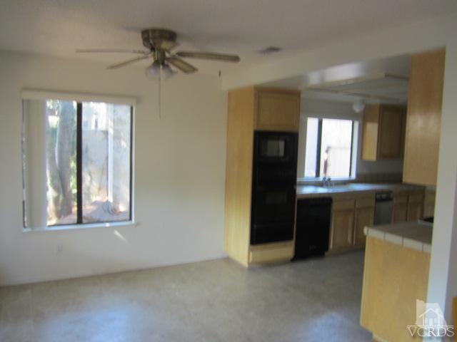237 Village Road Port Hueneme, CA 93041 - Photo 11 of 30 a view of a windows and a kitchen