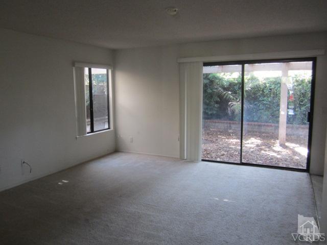 237 Village Road Port Hueneme, CA 93041 - Photo 12 of 30 a view of empty room with floor to ceiling windows