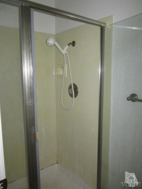 237 Village Road Port Hueneme, CA 93041 - Photo 19 of 30 a bathroom with a glass shower door