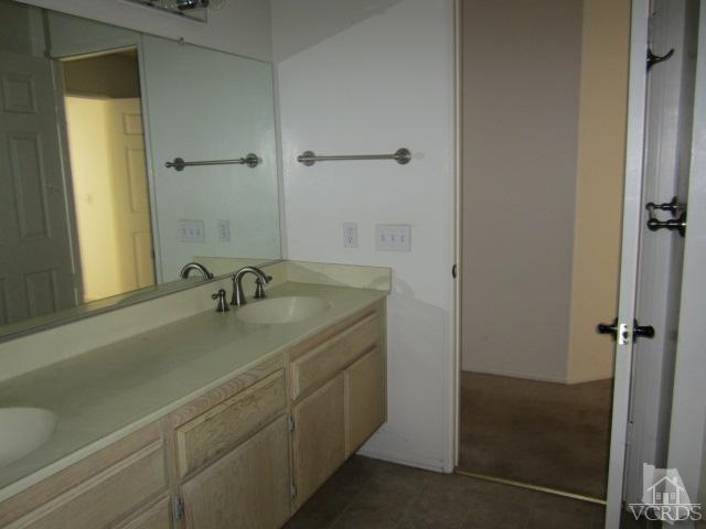 237 Village Road Port Hueneme, CA 93041 - Photo 21 of 30 a bathroom with a sink and a mirror