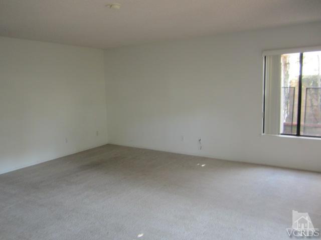237 Village Road Port Hueneme, CA 93041 - Photo 24 of 30 wooden floor and window in an empty room