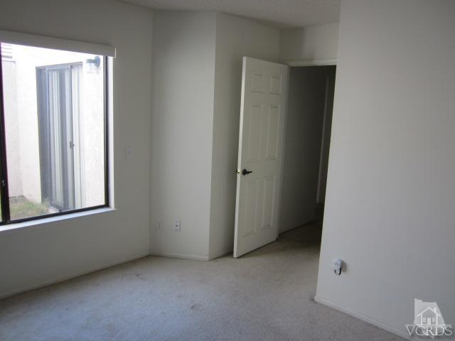 237 Village Road Port Hueneme, CA 93041 - Photo 25 of 30 an empty room with windows and closet