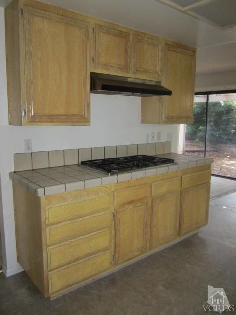 237 Village Road Port Hueneme, CA 93041 - Photo 10 of 30 a kitchen with granite countertop cabinets and sink