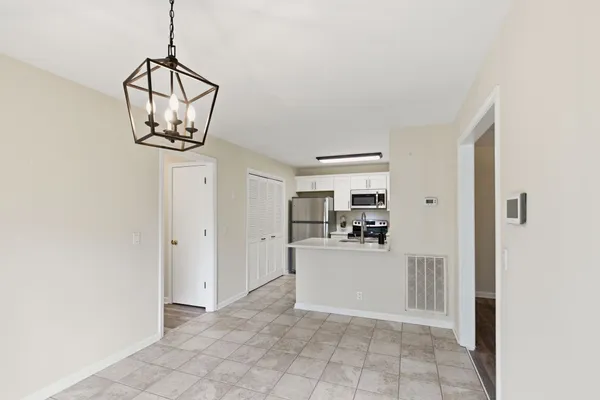 a view of a storage & utility room with a sink
