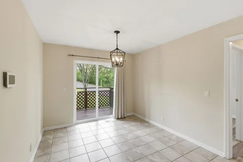 a view of a room with windows