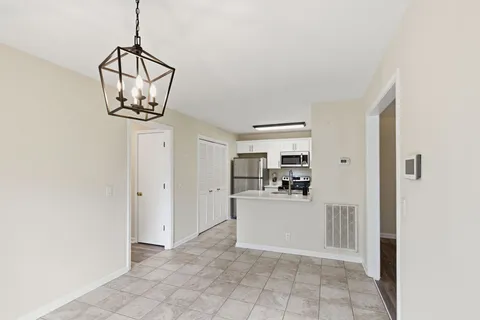 a view of a storage & utility room with a sink