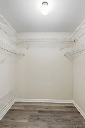 a view of a room with racks on the wall