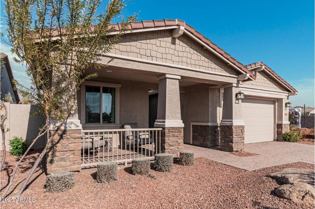 17386 West Bloomfield Road Surprise, AZ 85388 - Photo 3 of 31 a view of a house with patio