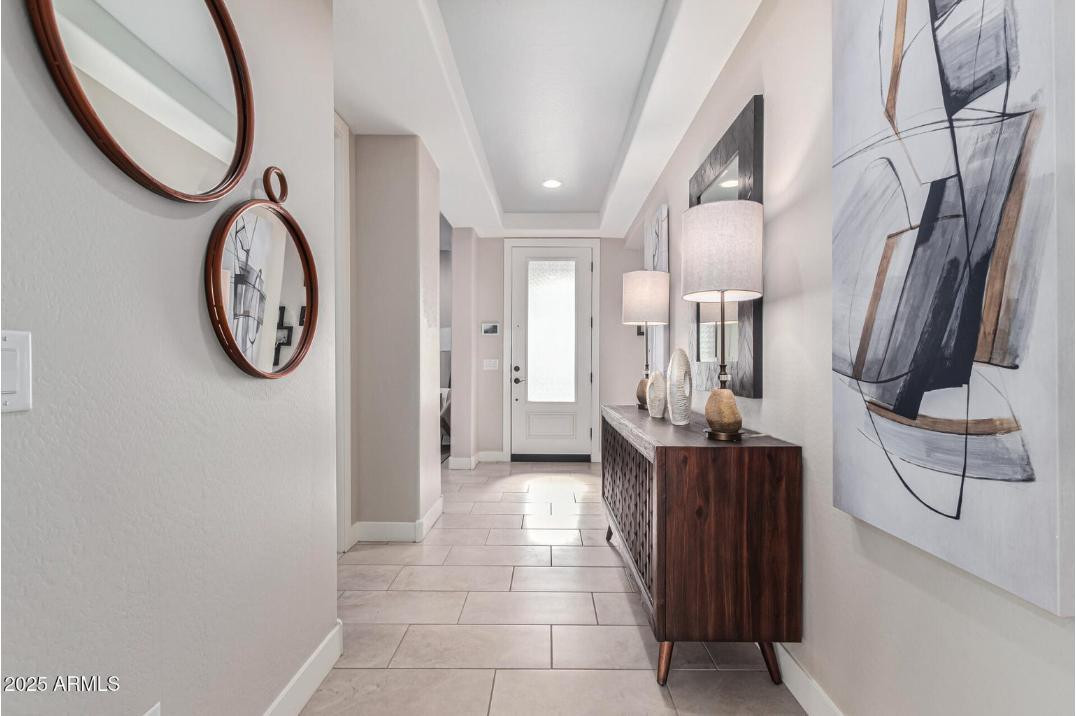 17386 West Bloomfield Road Surprise, AZ 85388 - Photo 5 of 31 a view of a hallway with seating area