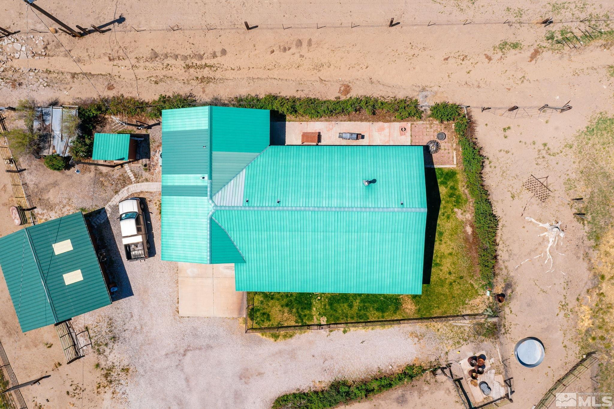 6811 Reno Highway Fallon, NV 89406 - Photo 30 of 33 an aerial view of a wooden house with a yard
