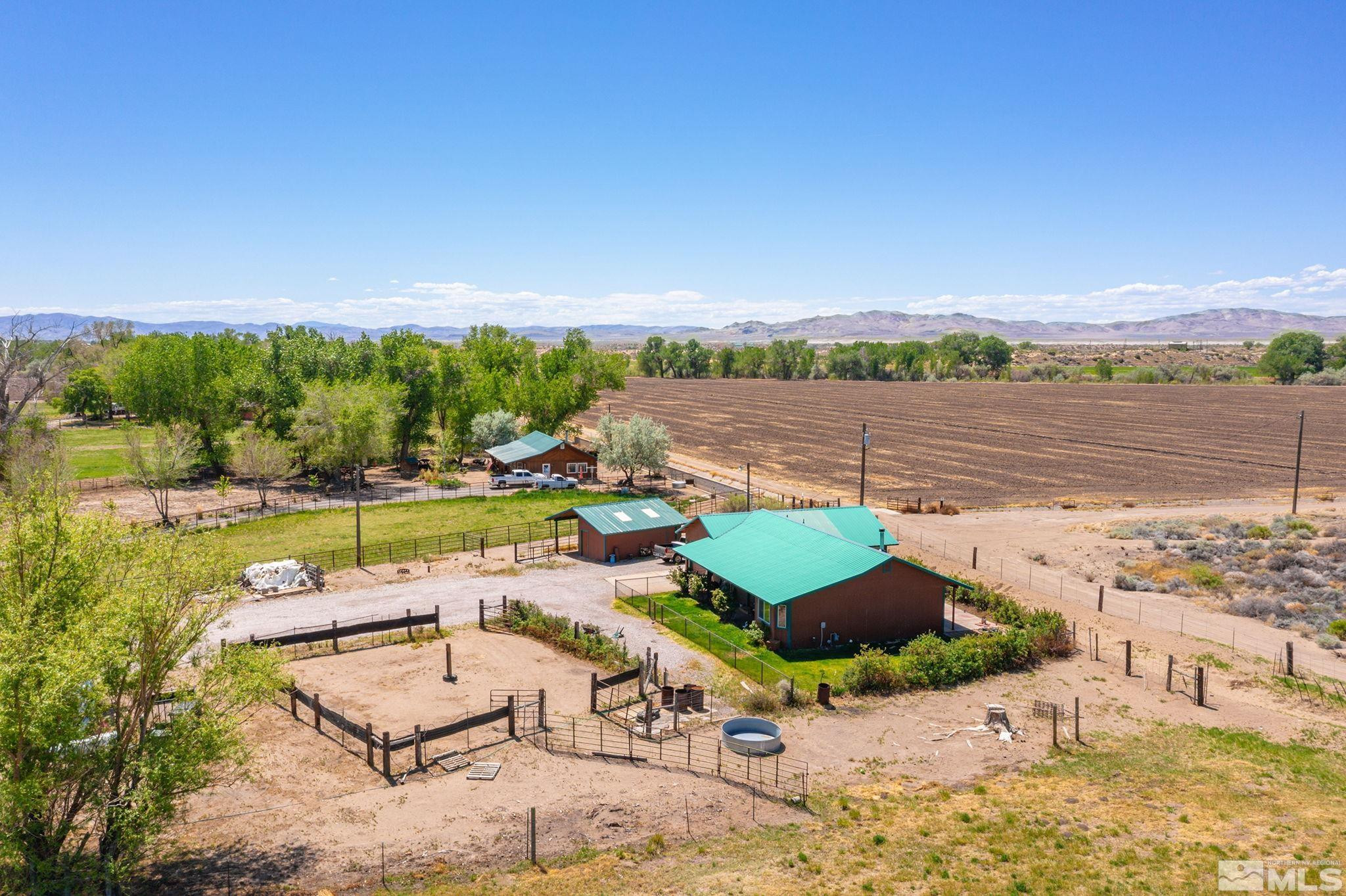 6811 Reno Highway Fallon, NV 89406 - Photo 31 of 33 aerial view of a house with outdoor space and lake view