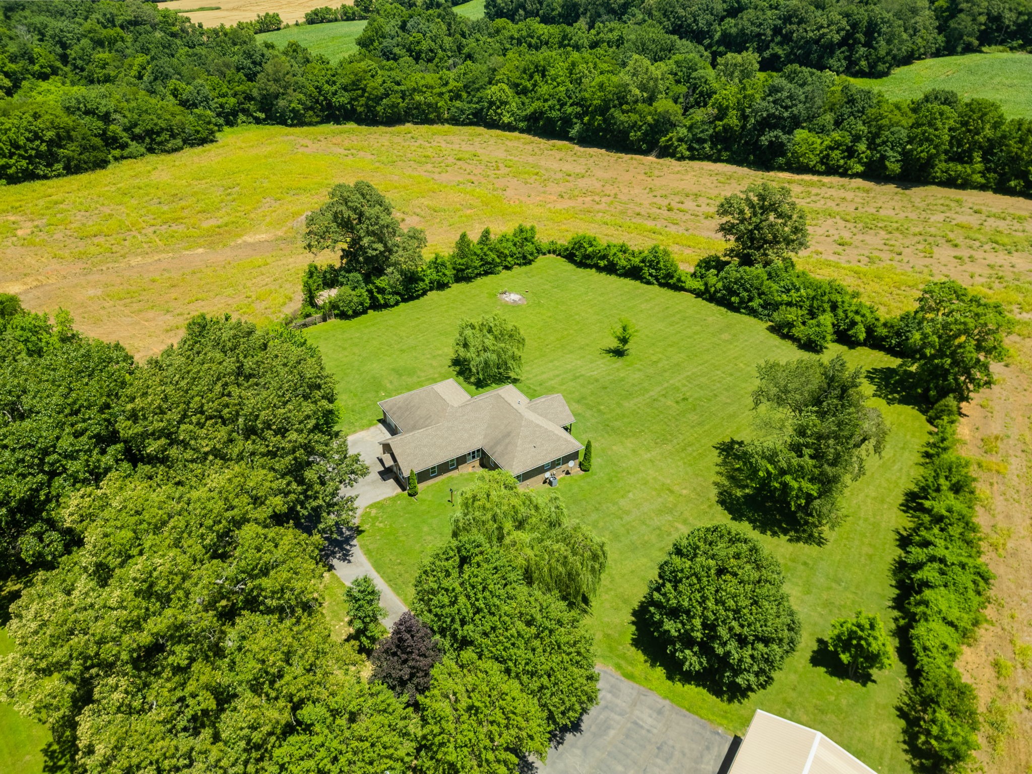 4266 Dot Road Springfield, TN 37172 - Photo 31 of 70 a view of a yard with a swimming pool