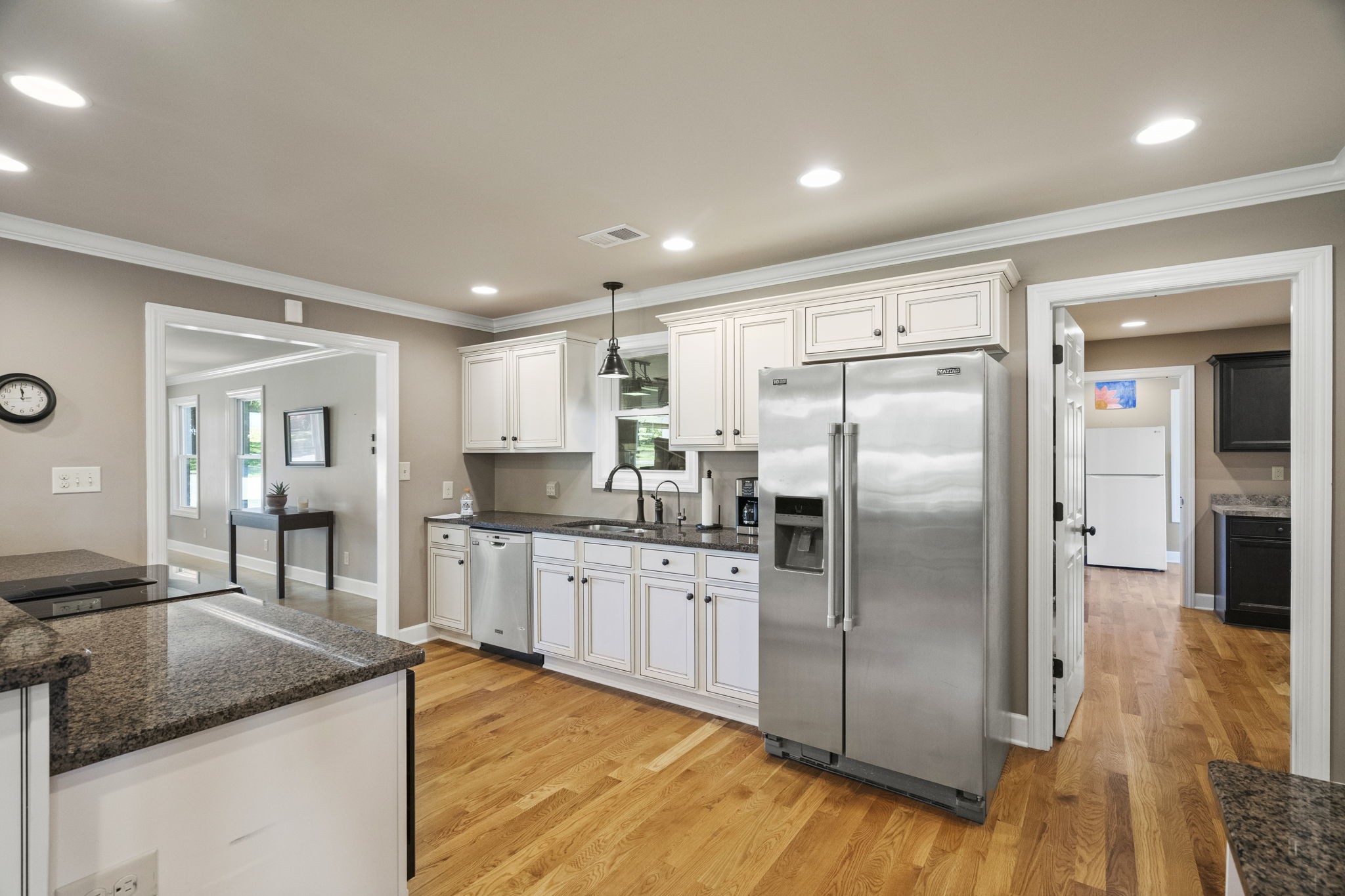 4266 Dot Road Springfield, TN 37172 - Photo 40 of 70 a kitchen with stainless steel appliances granite countertop a refrigerator a sink and a stove