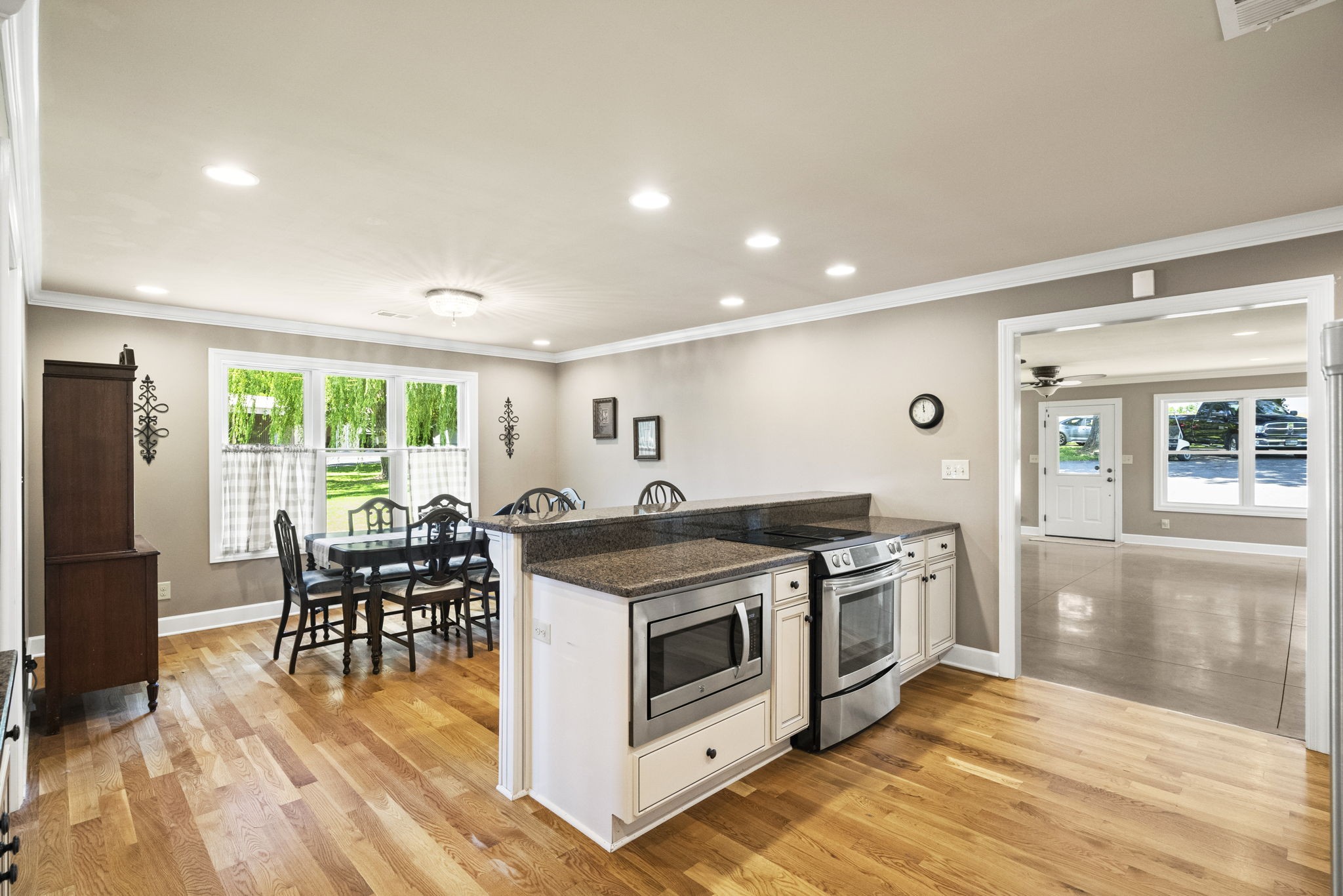 4266 Dot Road Springfield, TN 37172 - Photo 41 of 70 a kitchen with stainless steel appliances granite countertop a stove and a refrigerator